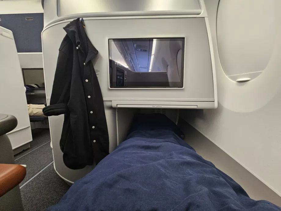 Ligga på ett utfällbart säte